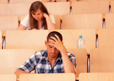 Students taking a test in a college classroom