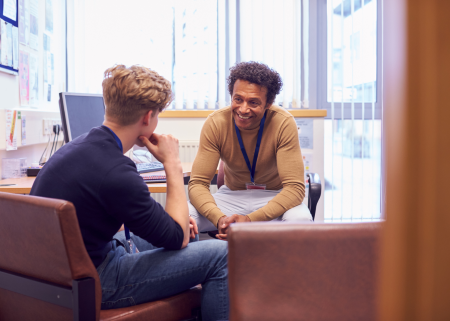 guidance counselor giving advice to student